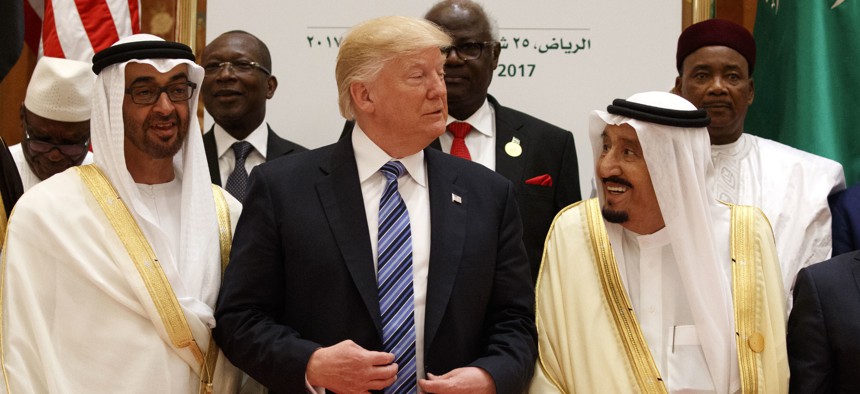 President Donald Trump talks with Saudi King Salman at the Arab Islamic American Summit, at the King Abdulaziz Conference Center, Sunday, May 21, 2017, in Riyadh, Saudi Arabia.
