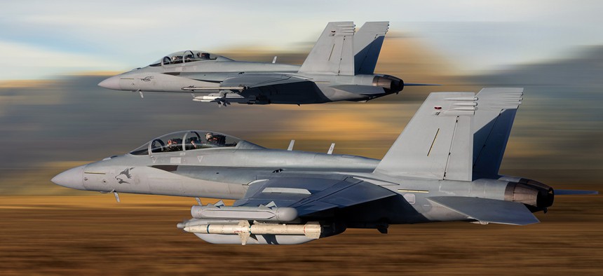 Two F/A-18s aloft in 2015.