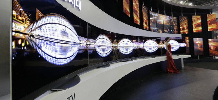 LG Electronics'Organic Light-emitting Diode (OLED) TVs are displayed during the 2014 Korea Electronics Show in Goyang, South Korea, Tuesday, Oct. 14, 2014.