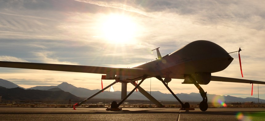 An MQ-1 Predator sits on the flight line. The predator started as an RQ-1 in the late 1990s providing reconnaissance until the early 2000s when it was equipped with two Hellfire missiles.