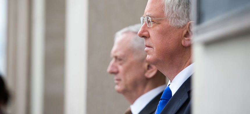 Defense Secretary Jim Mattis stands with the United Kingdom’s Secretary of State for Defence Sir Michael Fallon before a meeting at the Pentagon.