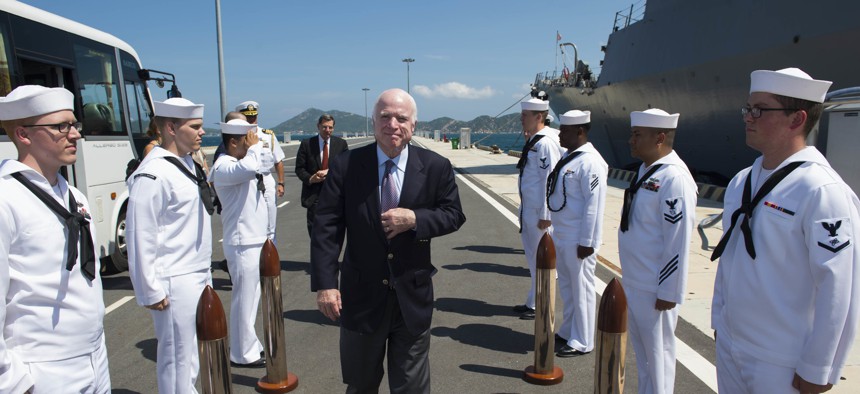 Sen. John S. McCain III is piped aboard during a visit to the Arleigh Burke-class guided-missile destroyer USS John S. McCain (DDG 56) in Cam Ranh, Vietnam, June 2, 2017.