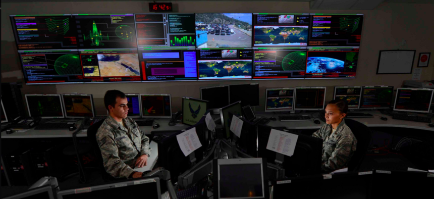 taff Sgt. Alex Garviria and 2nd Lt. Rachel James work in the Global Strategic Warning and Space Surveillance System Center Sept. 2, 2014, at Cheyenne Mountain Air Force Station, Colo. 