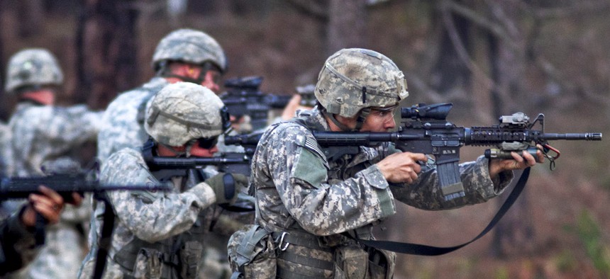 Scouts with the 82nd Airborne Division’s 1st Brigade Combat Team fire on a line during a course in advanced rifle marksmanship at Fort Bragg, N.C.