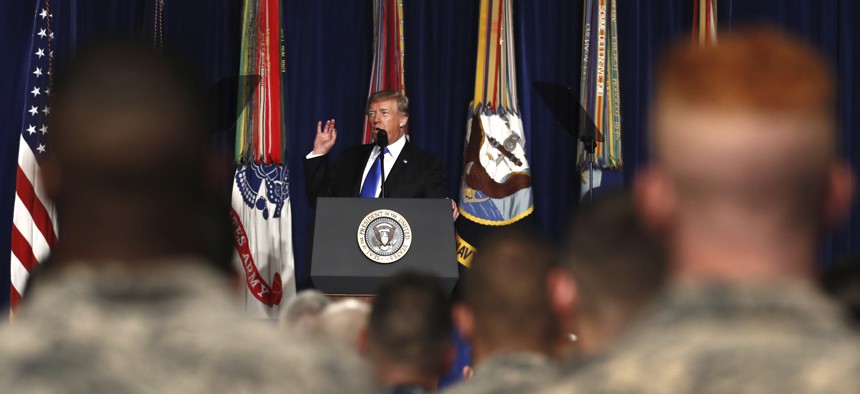 President Donald Trump speaks at Fort Myer in Arlington Va. about his policy for the ongoing war in Afghanistan.