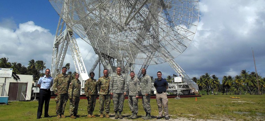United States Strategic Command commander Air Force Gen. John Hyten, fourth from right, visits SMDC's Reagan Test Site on Kwaj.