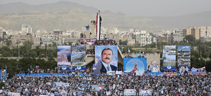 Supporters of former Yemeni President Ali Abdullah Saleh attend a ceremony to celebrate the 35th anniversary of the founding of the Popular Conference Party, in Sanaa, Yemen, Thursday, Aug. 24, 2017.