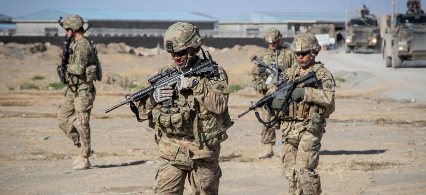 U.S. Soldiers with Forward Support Company, 65th Engineer Battalion conduct a presence patrol March 26, 2014, in Kandahar province, Afghanistan.