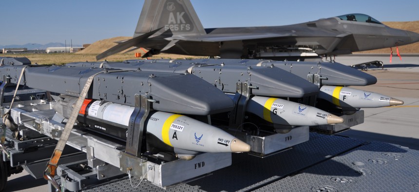 GBU-39 Small Diameter Bombs, made by Boeing, await loading on an F-22 Raptor in this 2012 file photo. 