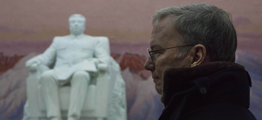 Executive Chairman of Google, Eric Schmidt stands near a statue of the late North Korean leader Kim Il Sung during a tour of the Grand Peoples Study House in Pyongyang, North Korea on Wednesday, Jan. 9, 2013