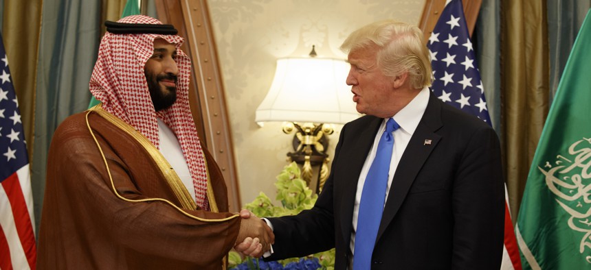 In this Saturday, May 20, 2017 file photo, President Donald Trump shakes hands with Saudi Deputy Crown Prince and Defense Minister Mohammed bin Salman during a bilateral meeting, in Riyadh. 