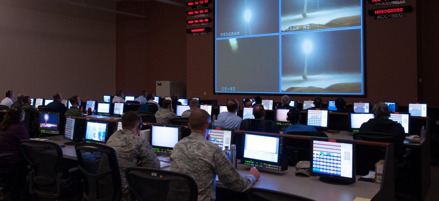 Members of the 576th Flight Test Squadron monitor an operational test launch of an unarmed Minuteman III missile March 27, 2015, at Vandenberg Air Force Base, Calif.