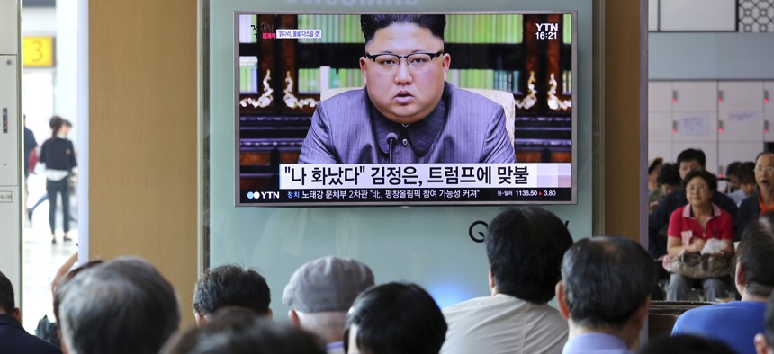  - In this Friday, Sept. 22, 2017, file photo, people watch a TV screen showing an image of North Korean leader Kim Jong Un delivering a statement in response to U.S. President Donald Trump's speech to the United Nations, in Pyongyang, North Korea.