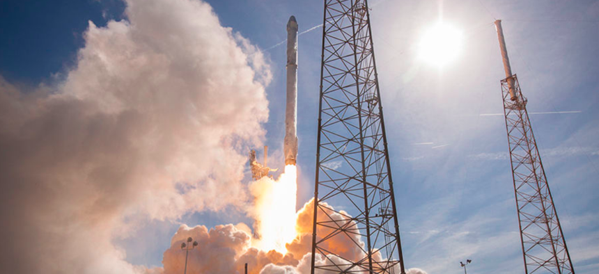 The initial launch of SpaceX's first re-flown rocket is shown here.