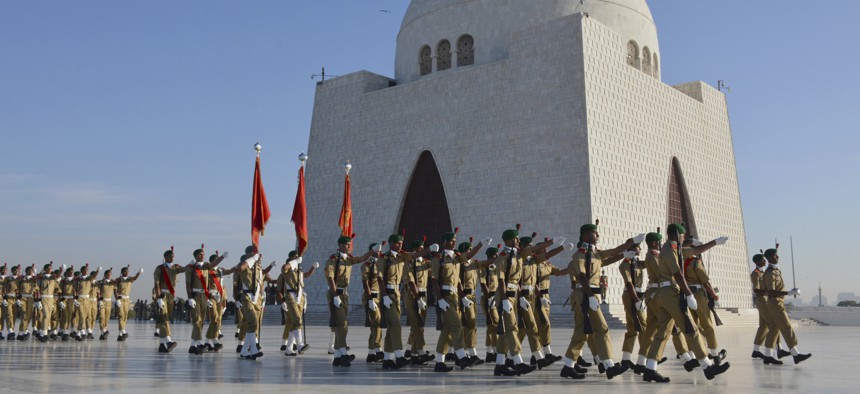 A contingent of the cadets of Pakistan army march during a change of the guard ceremony at the Jinnah mausoleum in Karachi, Pakistan.