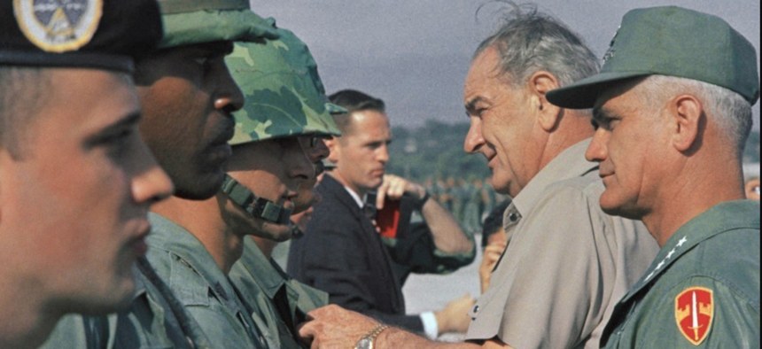President Lyndon B. Johnson and Gen. William Westmoreland in Vietnam on December 25, 1967, a month before the Tet Offensive.