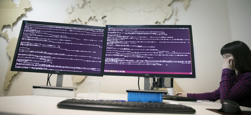 A computer code is seen on displays in the office of Global Cyber Security Company Group-IB in Moscow, Russia, Wednesday, Oct. 25, 2017.