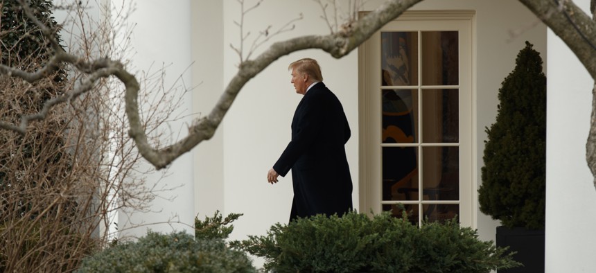 President Donald Trump walks to board Marine One on the South Lawn of the White House, Thursday, Feb. 1, 2018, in Washington.