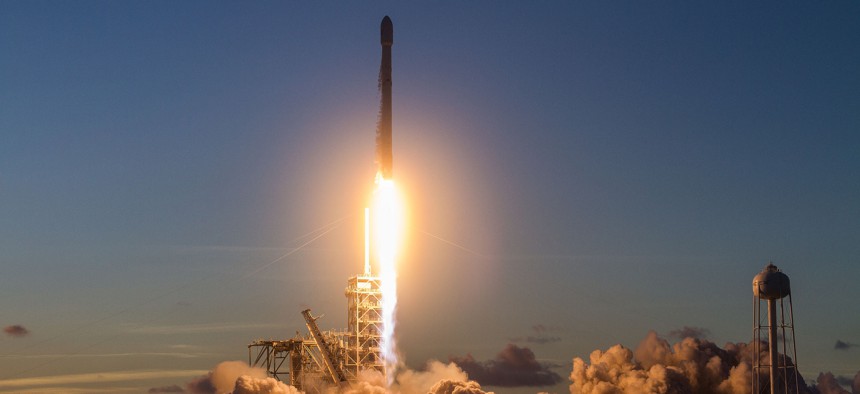 A SpaceX Falcon 9 rocket launchs the Echostar 105/SES-11 communications satellite from NASA’s Kennedy Space Center.