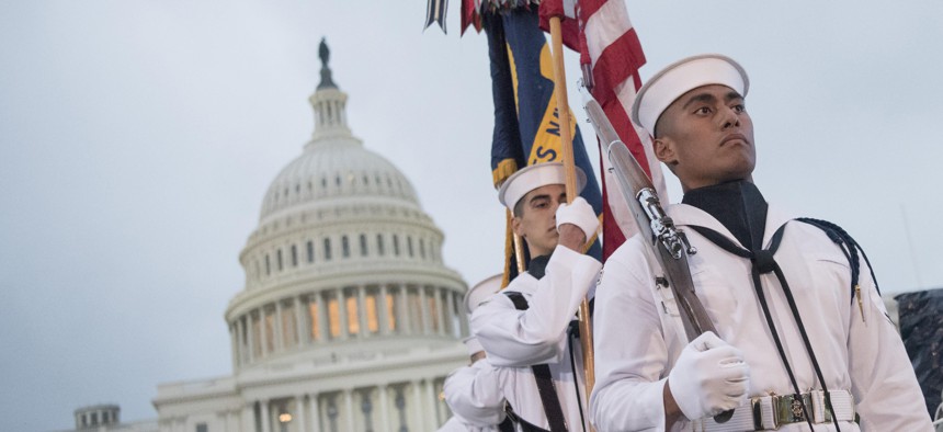 The U.S. Navy Ceremonial Guard parades the colors during the National Memorial Day concert on the west lawn of the U.S. Capitol in Washington, D.C., May 28, 2017.