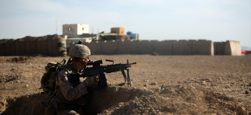 A U.S. Marine with Task Force Southwest provides security during a patrol near Bost Airfield, Afghanistan.
