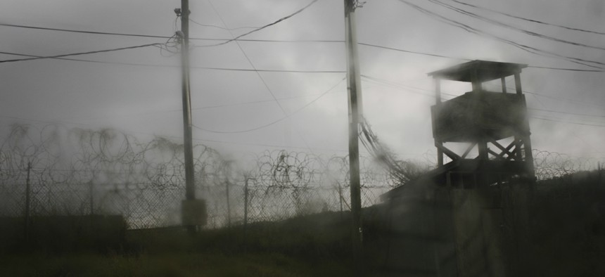 In this 2008 photo, a guard tower stands in the abandoned Camp X-Ray, the original and temporary detention facility on Guantanamo Bay U.S. Naval Base in Cuba.