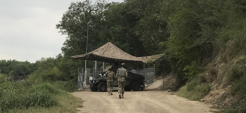 National Guard troops guard the border in Roma, Texas, on April 10, 2018.
