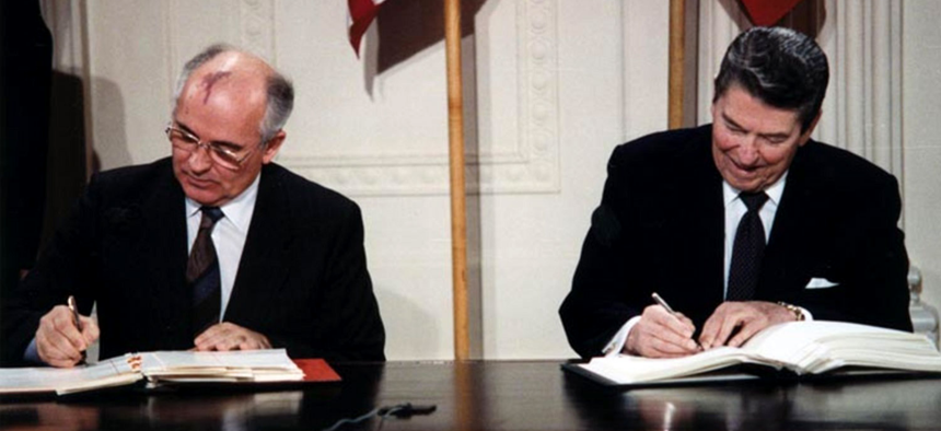 President Reagan and General Secretary Gorbachev signing the INF Treaty in the East Room of the White House on Dec. 8, 1987.