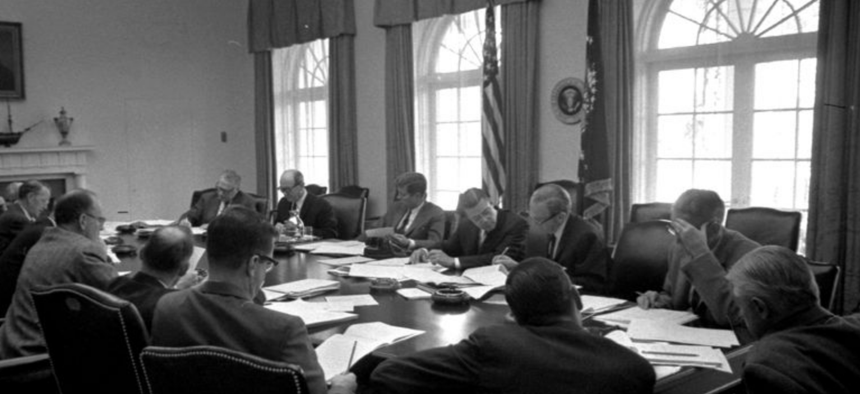 President John F. Kennedy meets with members of the Executive Committee of the National Security Council (EXCOMM) regarding the crisis in Cuba on October 29, 1962