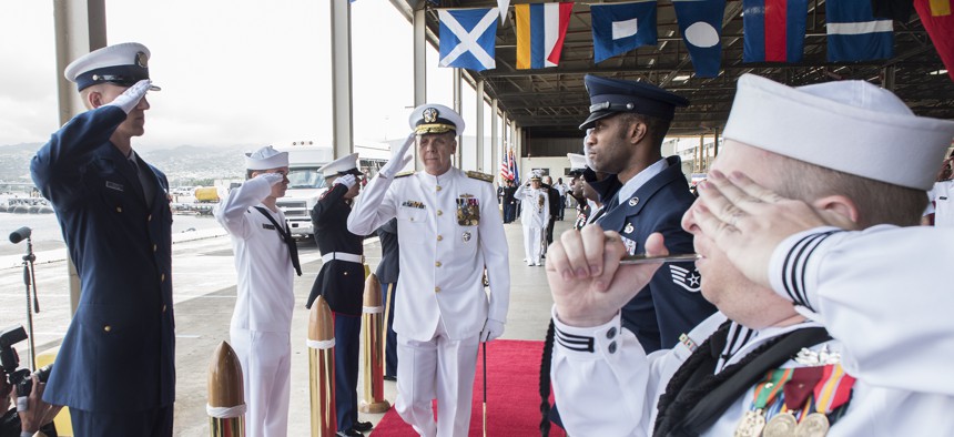 Adm. Phil Davidson, commander of the newly renamed U.S. Indo-Pacific Command, is piped aboard during the USPACOM change of command ceremony.