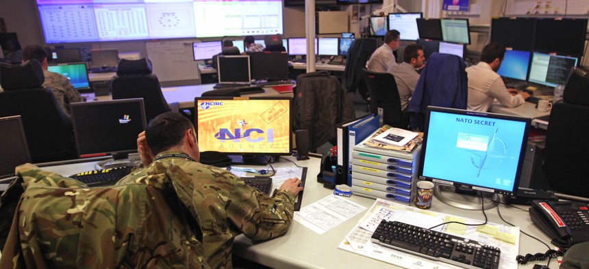 Staff operate at the NATO Computer Incident Response Capability (NCIRC) technical center, at NATO's military headquarters SHAPE in Mons, southwestern Belgium, Tuesday, Dec. 10, 2013.