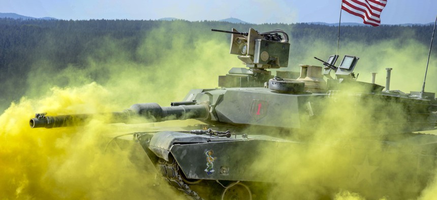 Soldiers in an M1 Abrams tank compete in the Strong Europe Tank Challenge at the Grafenwoehr Training Area in Germany, June 6, 2018.