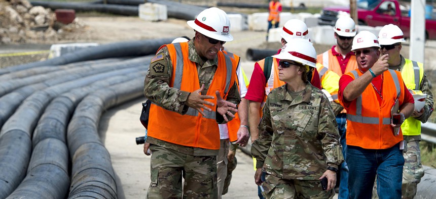 Army Brig. Gen. Diana Holland, commander of the Army Corps of Engineers' South Atlantic Division, surveys Guajataca Dam in Puerto Rico, Oct. 23, 2017.