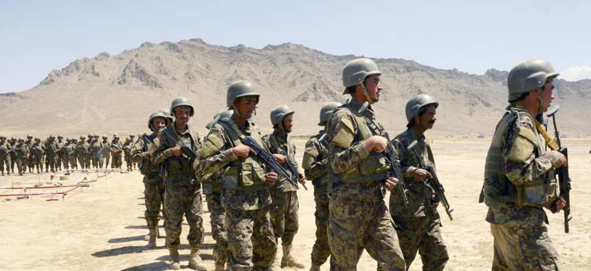 Afghan National Army-Territorial Force members prepare for an exercise at the Kabul Military Training Center in Kabul, Afghanistan, June 11, 2018.