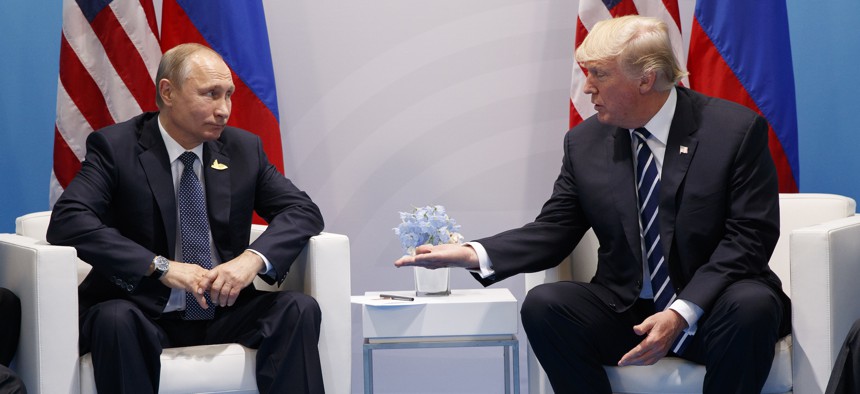 President Donald Trump meets with Russian President Vladimir Putin at the G20 Summit at the G20 Summit, Friday, July 7, 2017, in Hamburg.