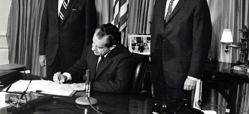 President Richard Nixon signs the Treaty on the Non-Proliferation of Nuclear Weapons, or NPT.
