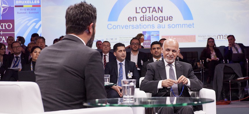 Afghan President Ashraf Ghani speaks at the NATO Summit sideline event "NATO Engages" with Defense One Executive Editor Kevin Baron, in Brussels, Thur., July 12, 2018.