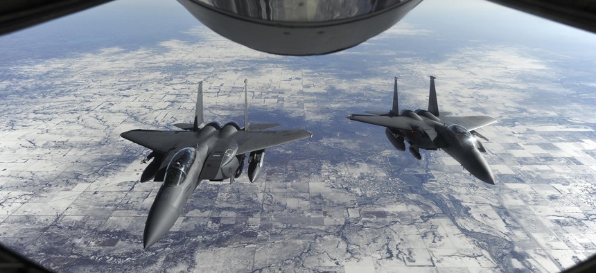 The proposed F-15X will have a one-person cockpit, not the pilot-and-weaponeer team in these F-15E Strike Eagles.