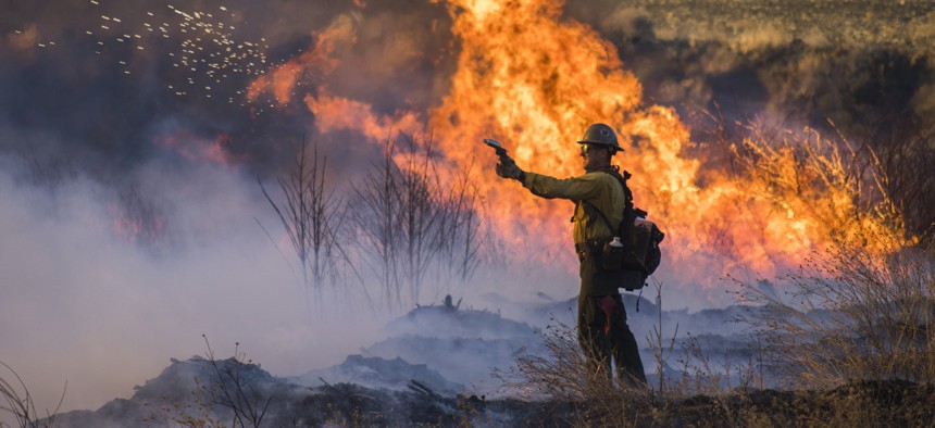The Thomas Fire burns in the hills above Los Padres National Forest during a firing operation on December 20, 2017.