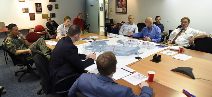In a 2016 wargame, a joint set of participants works out Air Force coordination with the Navy's Distributed Lethality concept.