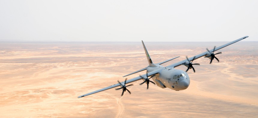 A C-130J Hercules aircraft from the 115th Airlift Squadron at Channel Islands Air National Guard Station, Calif., flies over Jordan during Exercise Eager Lion May 31, 2014, at an air base in northern Jordan. 