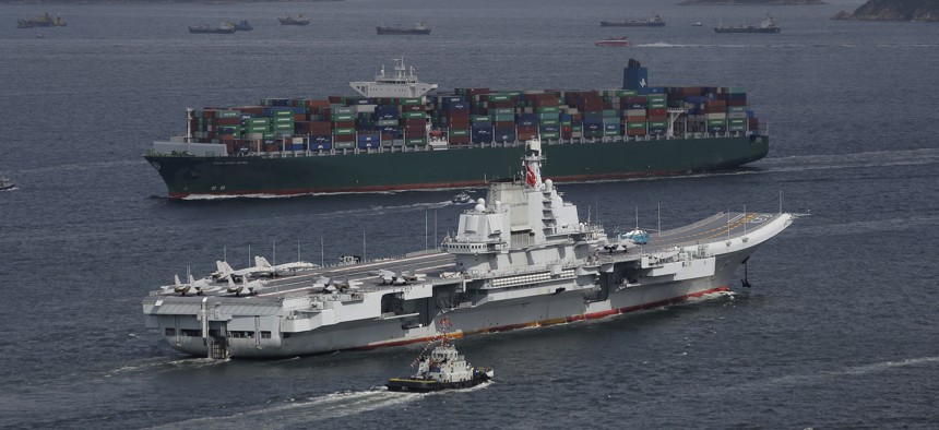 Liaoning, China's first aircraft carrier, sails into Hong Kong for a port call in 2017.