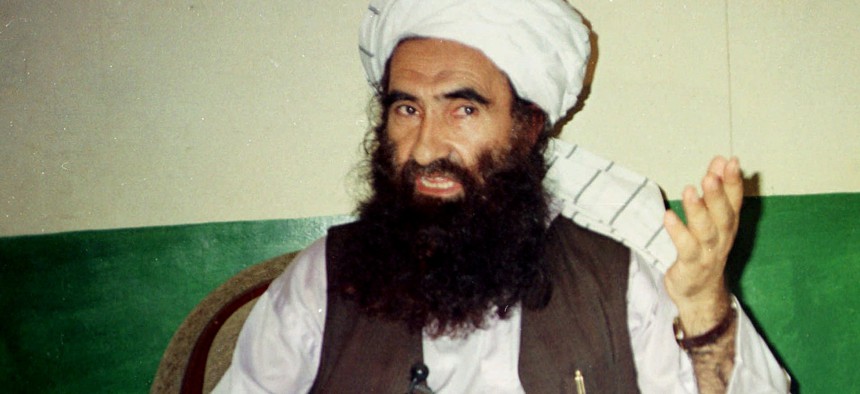 In this Aug. 22, 1998 file photo, Jalaluddin Haqqani, founder of the militant group the Haqqani network, speaks during an interview in Miram Shah, Pakistan.