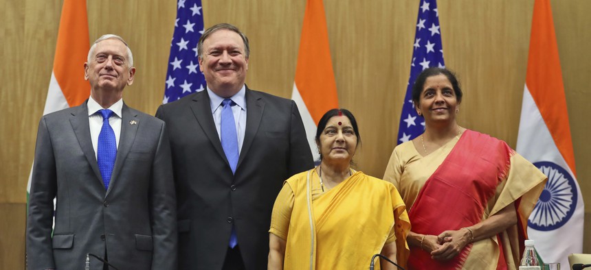 U.S. Defense Secretary James Mattis, U.S. Secretary of State Mike Pompeo, Indian Foreign Minister Sushma Swaraj and Indian Defense Minister Nirmala Sitharaman pose after making a joint statement after the "2+2" meeting in New Delhi, India, Sept. 6, 2018.