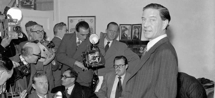 In this file photo dated Nov. 8, 1955, former British diplomat who was at that time accused of spying for Russia, during a press conference at his parents' home in London on Nov. 8, 1955.