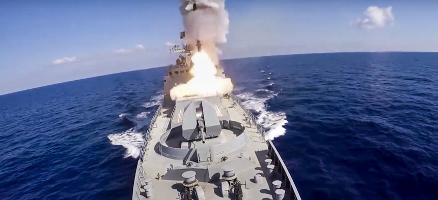 In this image provided by Russian Defense Ministry Press Service and released on Friday, June 23, 2017, long-range Kalibr cruise missiles are launched by a Russian Navy ship in the eastern Mediterranean.