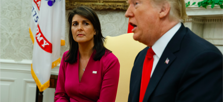 President Donald Trump speaks during a meeting with outgoing U.S. Ambassador to the United Nations Nikki Haley in the Oval Office of the White House, Tuesday, Oct. 9, 2018, in Washington. 