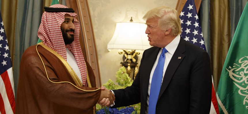 In this May 20, 2017 photo, President Donald Trump shakes hands with Saudi Deputy Crown Prince and Defense Minister Mohammed bin Salman in Riyadh.