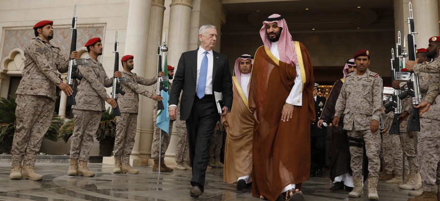 In this April 19, 2017 photo, U.S. Defense Secretary James Mattis, center left, departs after his meeting with Saudi Arabia's Deputy Crown Prince and Defense Minister Mohammed bin Salman, center right, in Riyadh, Saudi Arabia.