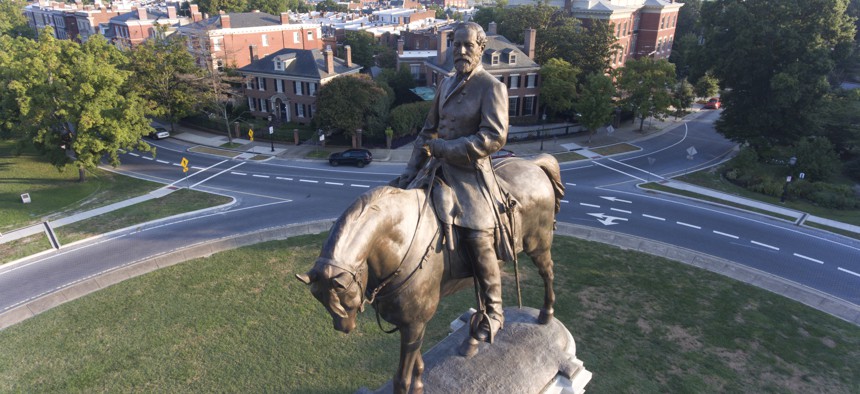 This Tuesday, Aug. 22, 2017, photo shows a view of the statue of Confederate General Robert E. Lee on Monument Avenue in Richmond, Va. 